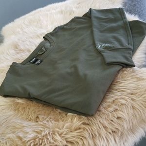 Victoria  Sport  sweatshirt with open back.